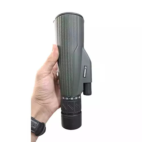 دوربین تک چشمی کانون با سه پایه و هولدر موبایل مدل 10-30X50
