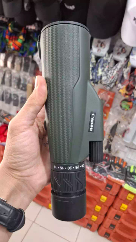 دوربین تک چشمی کانون با سه پایه و هولدر موبایل مدل 10-30X50 جدید