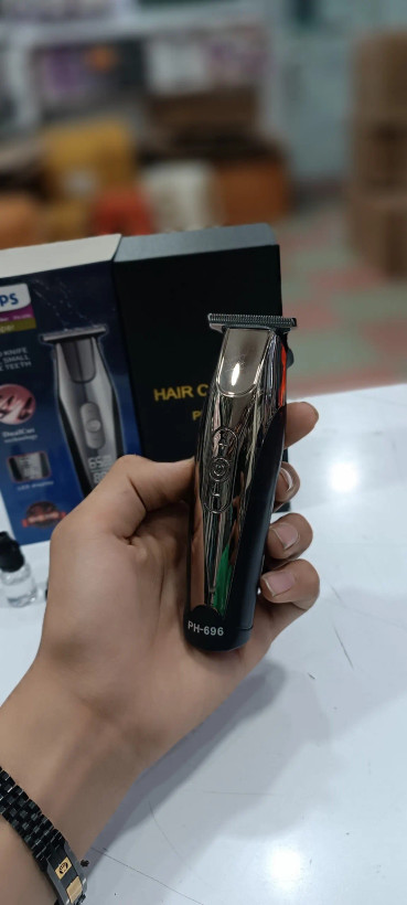 دستگاه اصلاح موی بدن و صورت فیلیپس PHILIPS 696 مدل صفرزن
