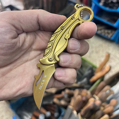 چاقوی جیبی تاشو BUCK X60 با تیغه خمیده و طراحی کارامبیت